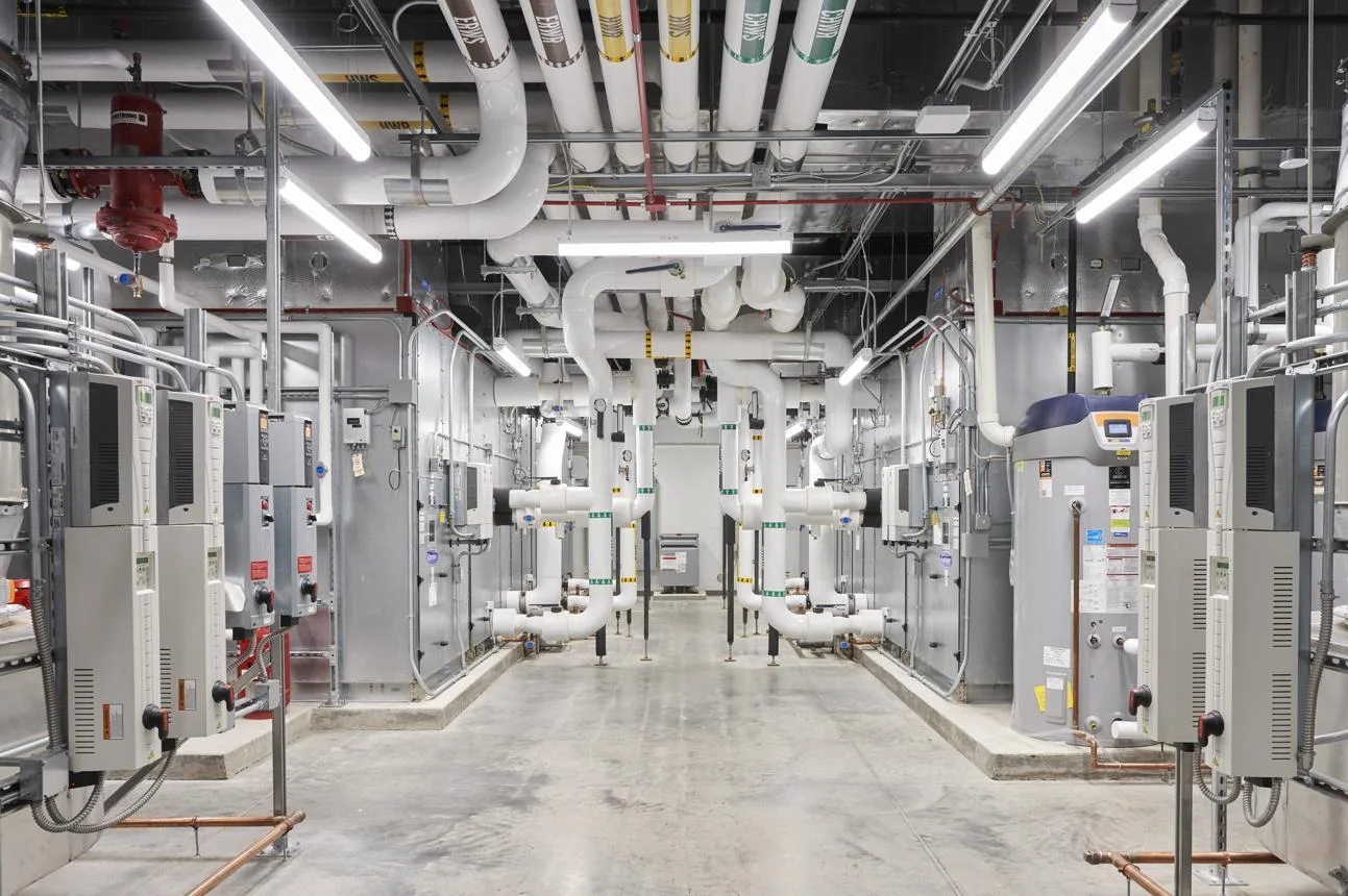 Mechanical plant room with coordinated pipework and utility equipment