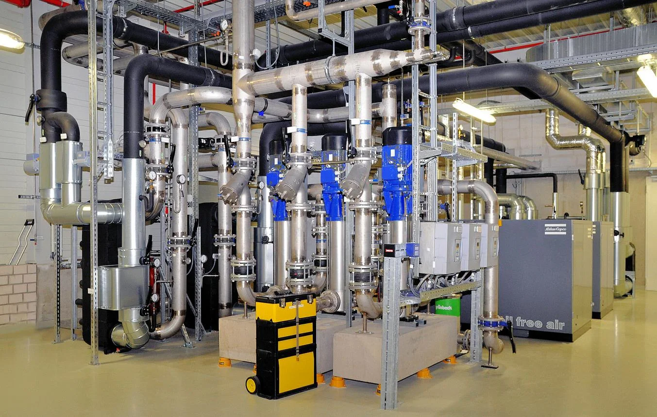 Mechanical utility installation with insulated piping and equipment
